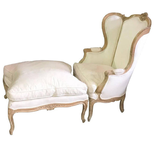 French Louis XVI Style Carved Bleached Walnut Bergere with Ottoman, 19th Century